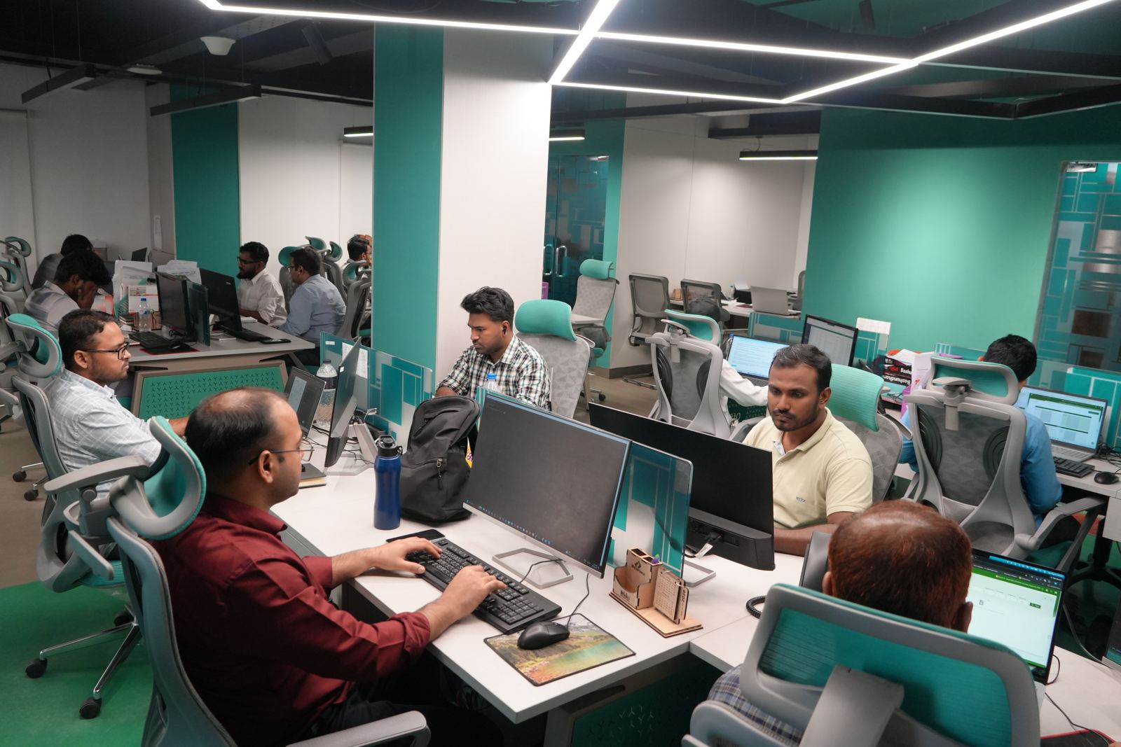 Engineers at work in Girmairi's Dhaka office